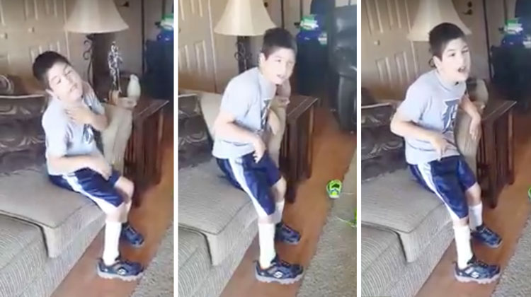 boy with cerebral palsy attempts to stand off of couch