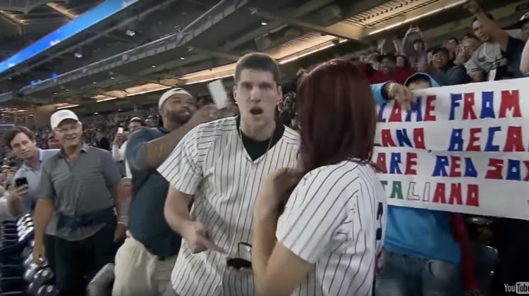 man in yankees shirt horrified look pointing to empty ring box