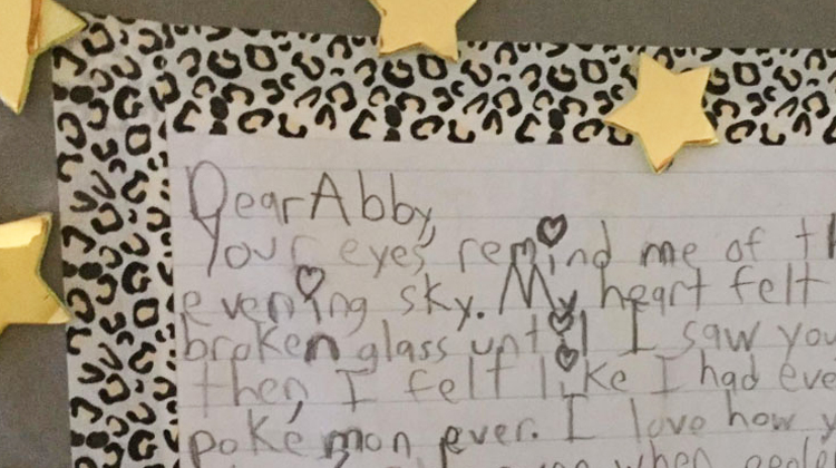 letter in messy handwriting with gold stars