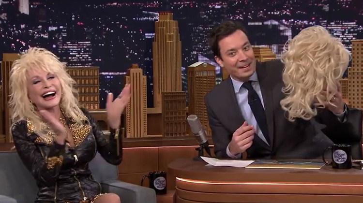 dolly laughing while jimmy holds wig