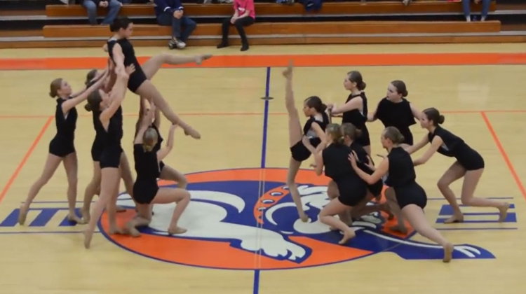 dancers in black leotards