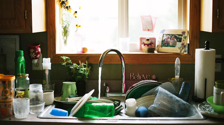 sink full of dirty dishes