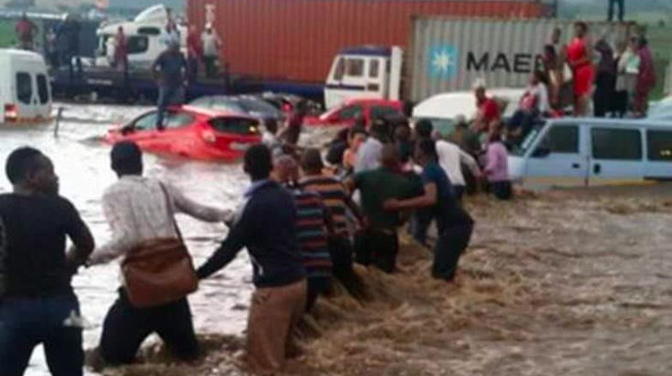 human chains through flash flood