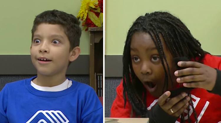 boy and girl with shocked open mouth faces