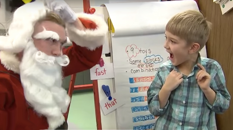 santa removing disguise