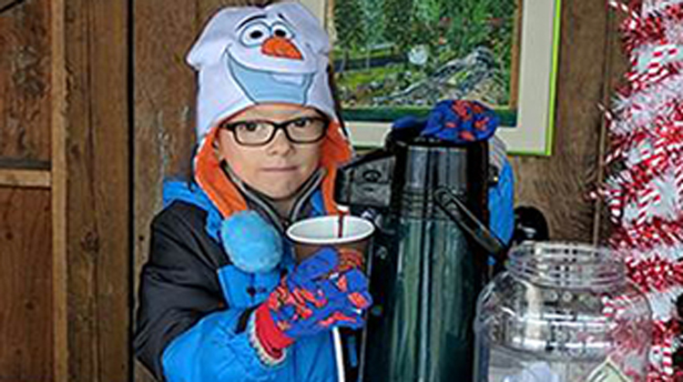 little boy in frozen hat