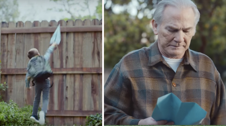 boy throwing blue airplane over fence, old man reading blue note