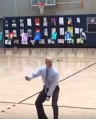 dancing principal at pep rally