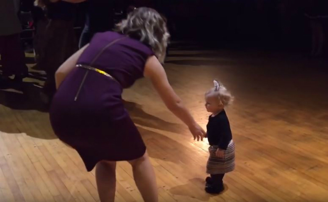 mom tries to escort off dance floor