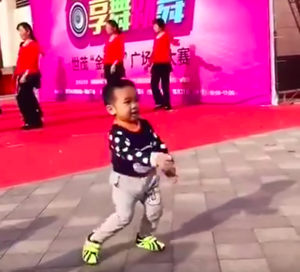 dancing chinese boy