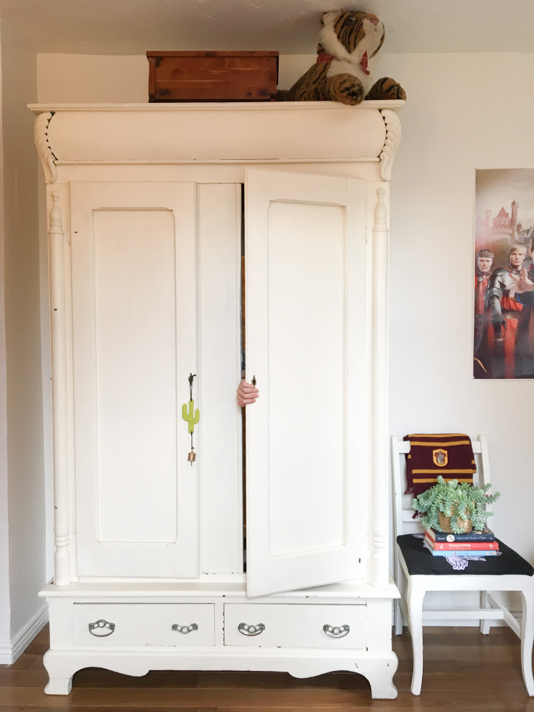 fingers-poking-out-of-armoire