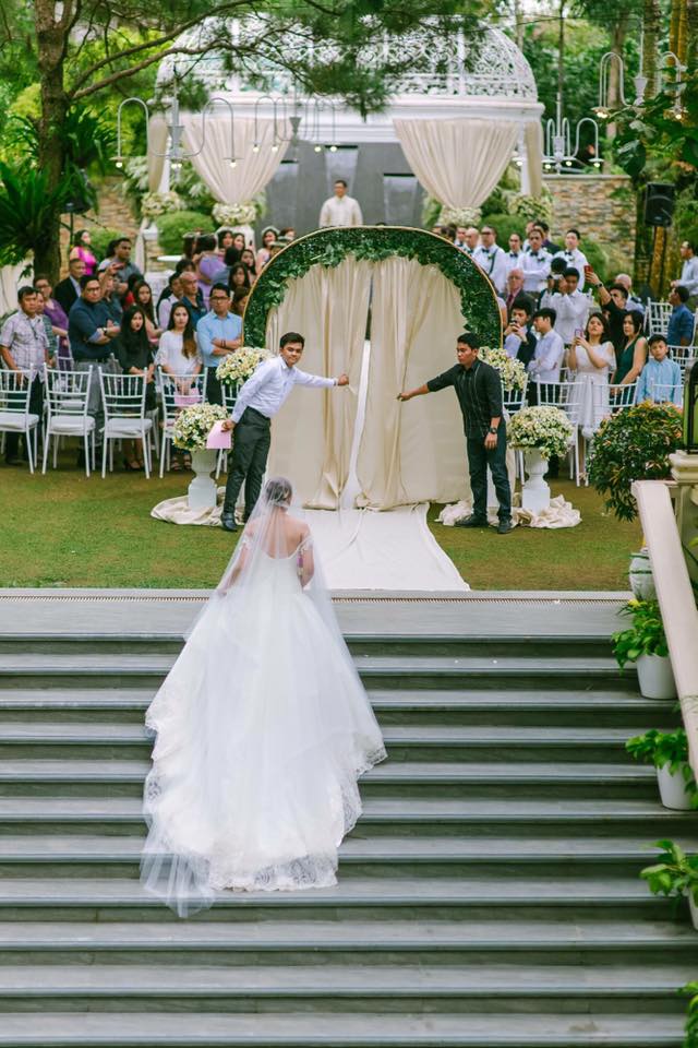 bride walking up steps