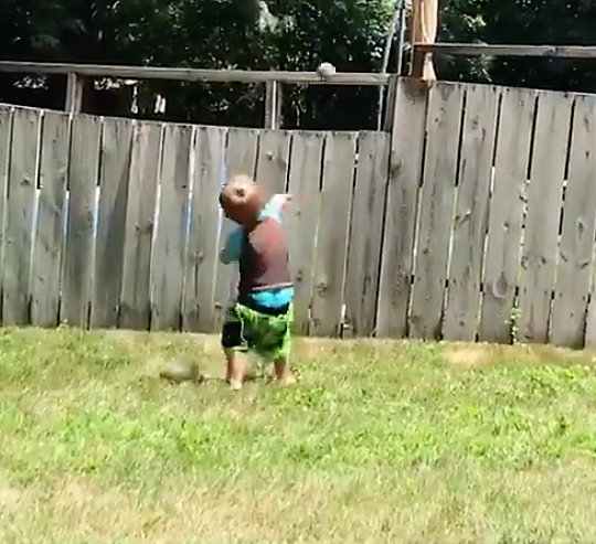 boy throwing ball