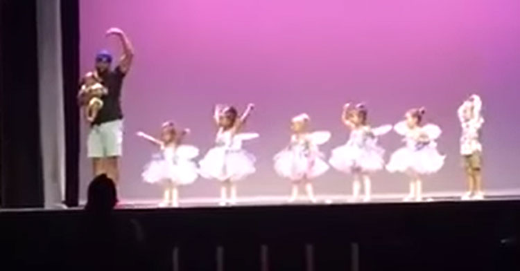 dad onstage with ballerinas