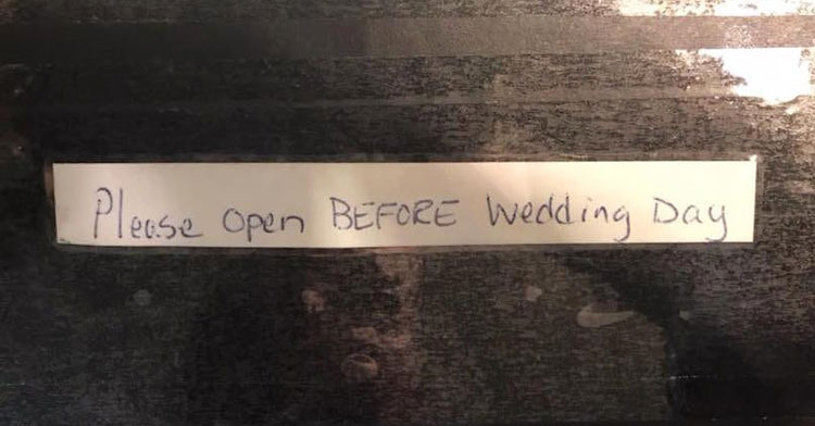 package that says 'please open before wedding day'
