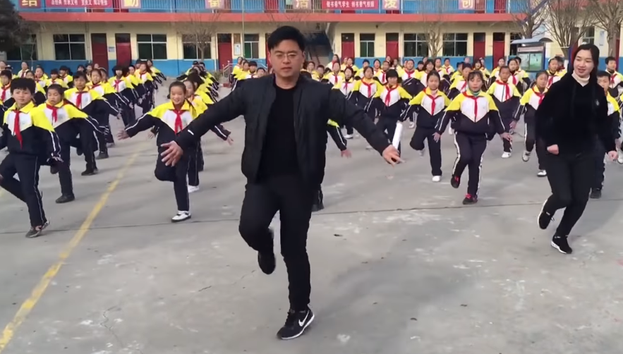 principal leads dance formation