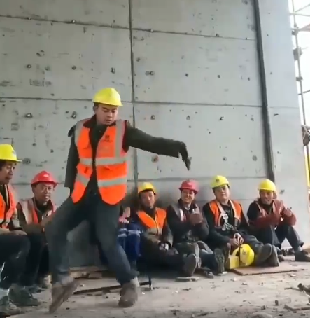 construction worker dances