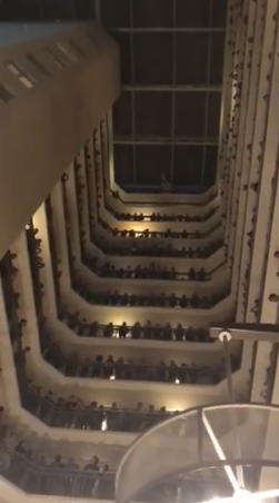 choir sings from hotel balconies