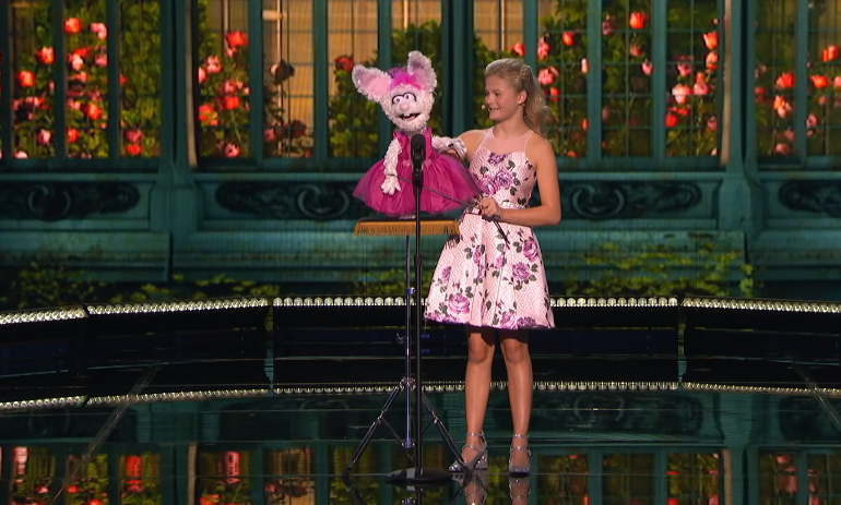 darci and petunia on stage