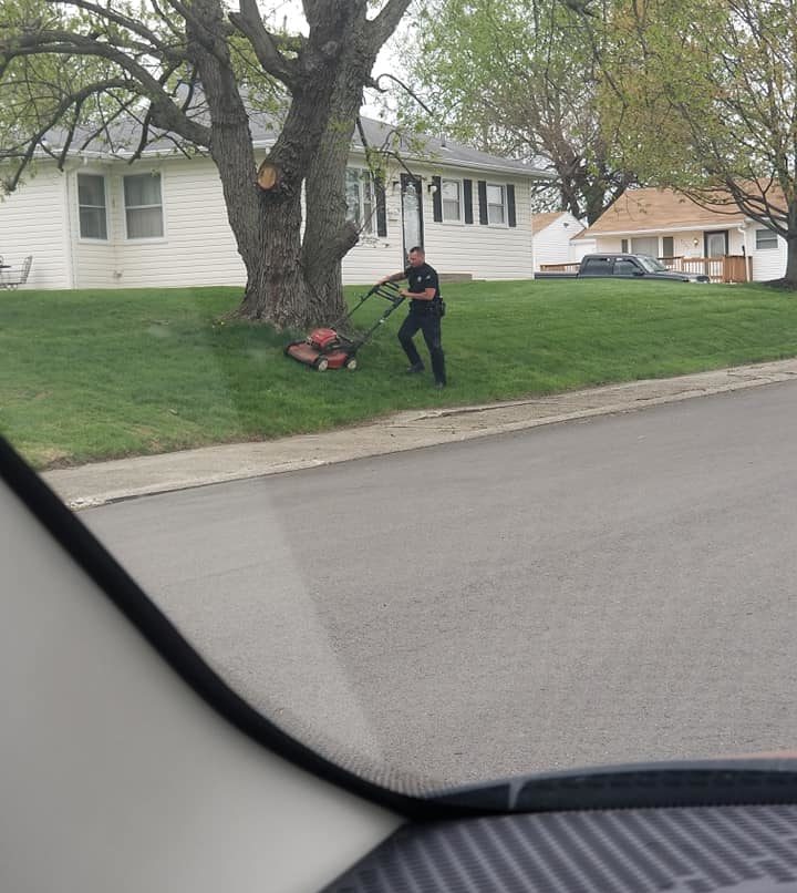 officer banks mows lawn