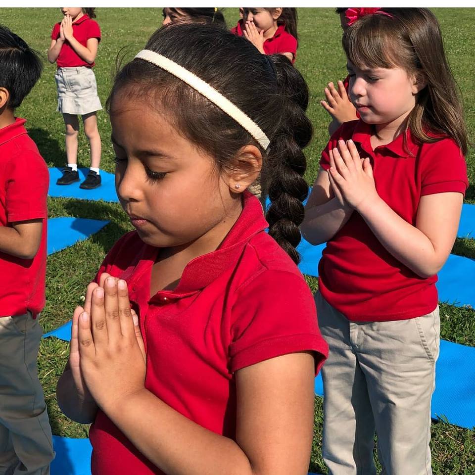 kids practice yoga