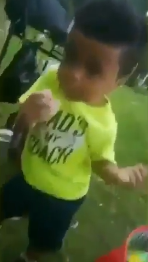 kid dances for donut