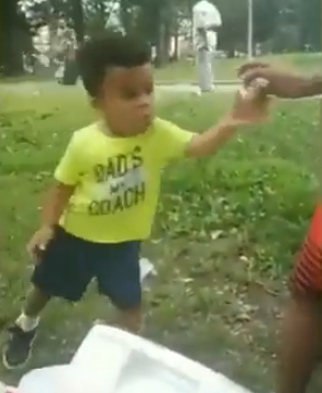 kid dances for donut