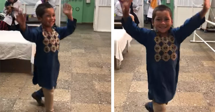 dancing afghan boy