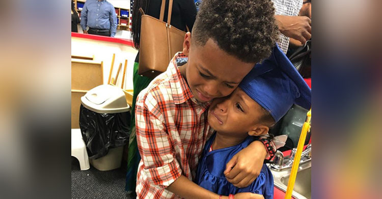 preschool graduation hug
