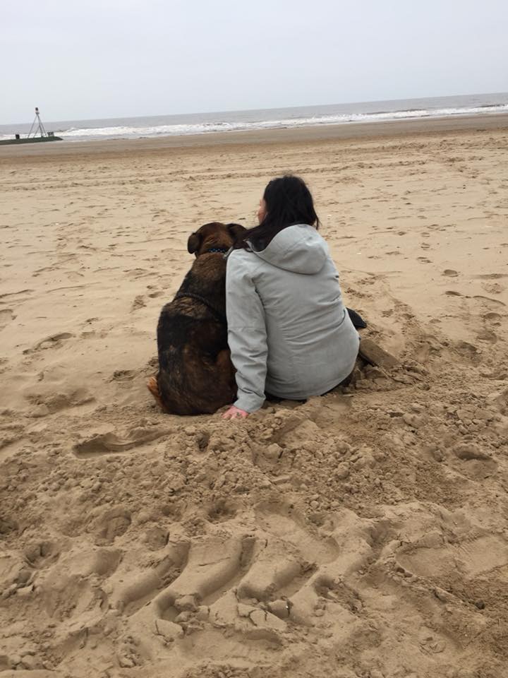 nicole and dog on beach