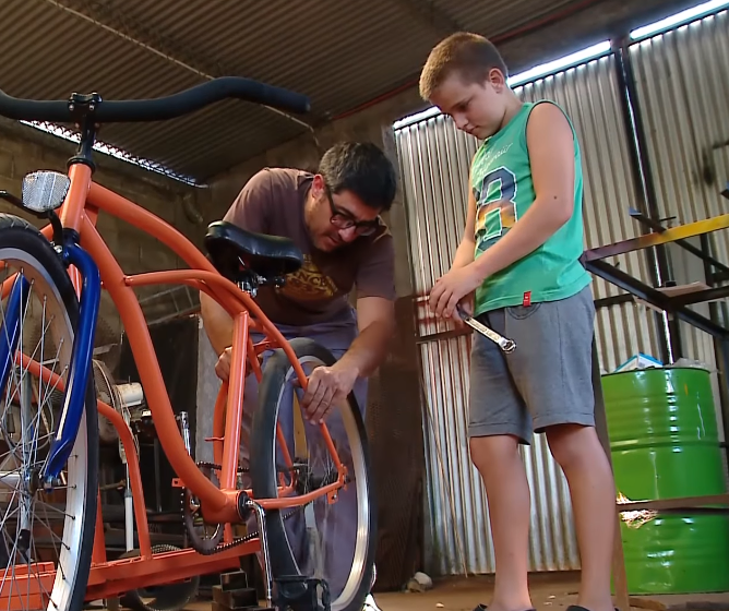 blacksmith builds tandem bike