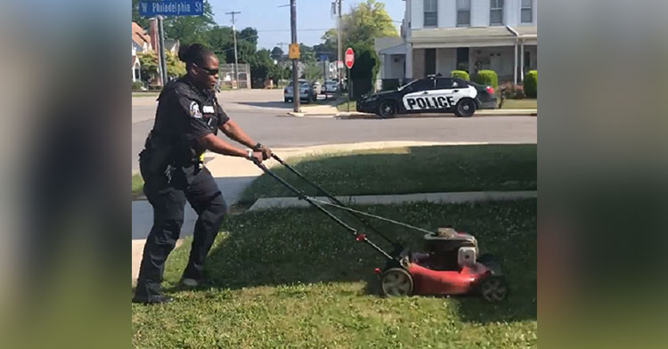 cop mowing lawn