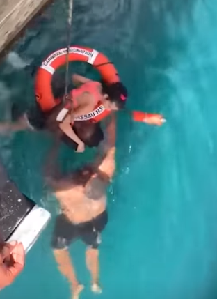 men rescue cruise ship passenger