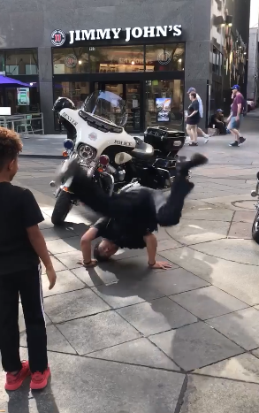 cop break dance battle