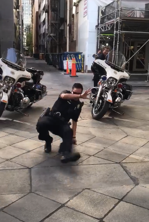 cop break dance battle