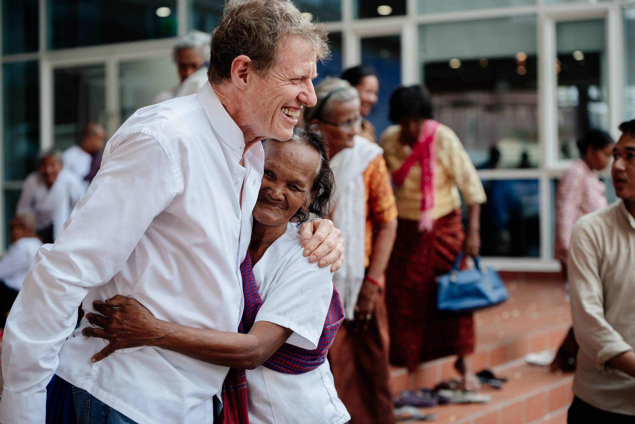 scott hugs cambodian woman