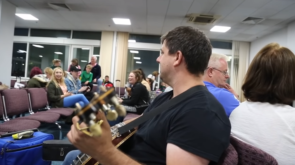 irish musicians play at newcastle airport