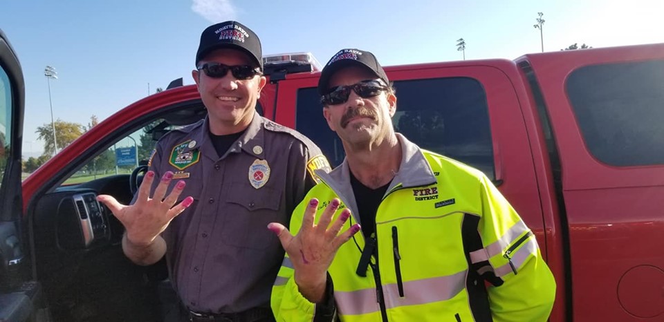 firefighters with painted nails