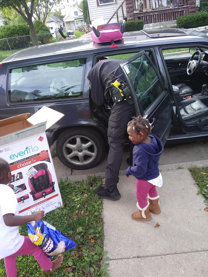 officer Zimmerman installs car seat