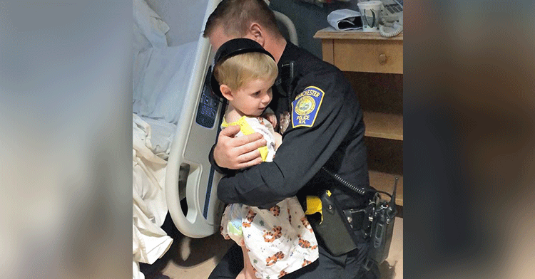 cop hug boy