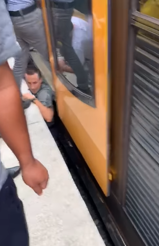 passengers rescue girl under train