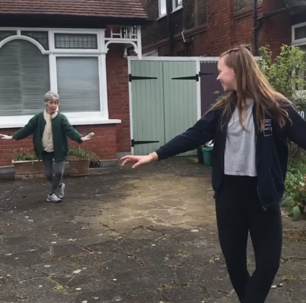 grandma dances with granddaughter