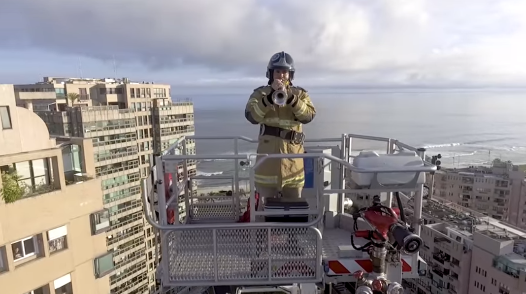 firefighter plays trumpet brazil