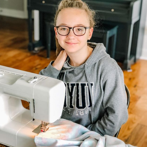 lucy at sewing machine