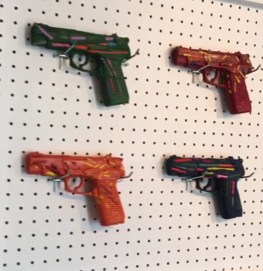 one gun art display