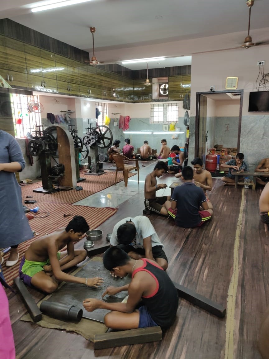 boys in jewelry factory