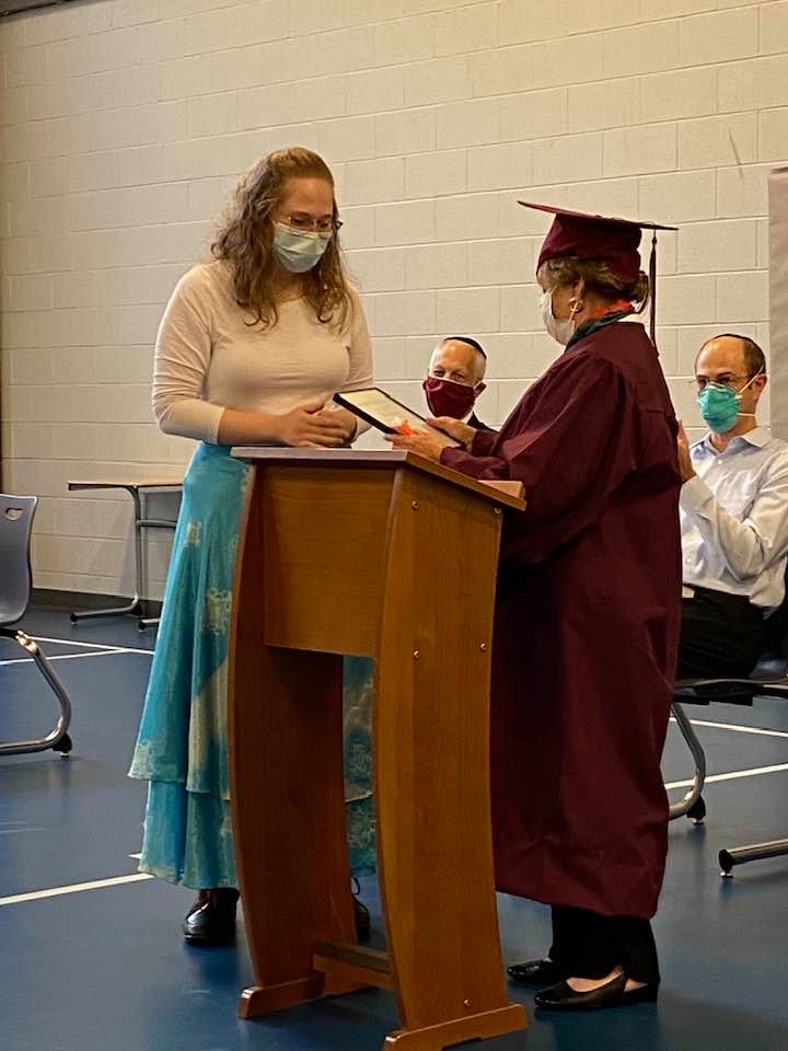 miriam receives diploma
