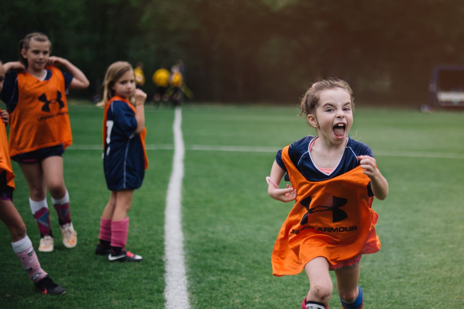 girls play soccer