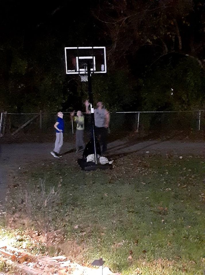 family plays basketball