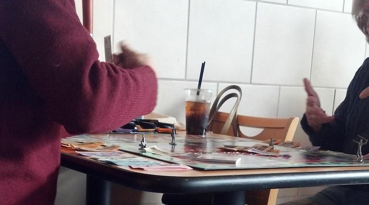 couple playing monopoly